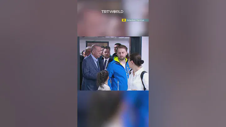 Voter surprised to notice Erdogan waiting behind him in line